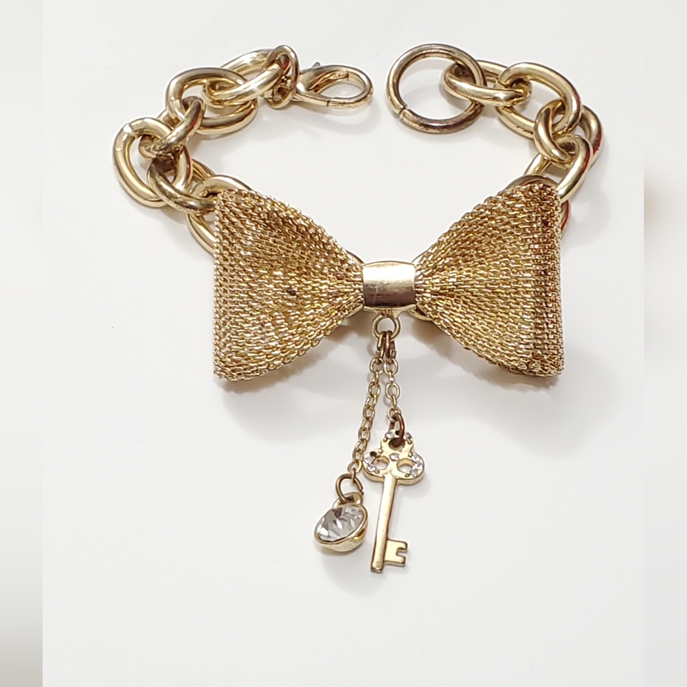 Vintage Gold Bow Bracelet by Guess